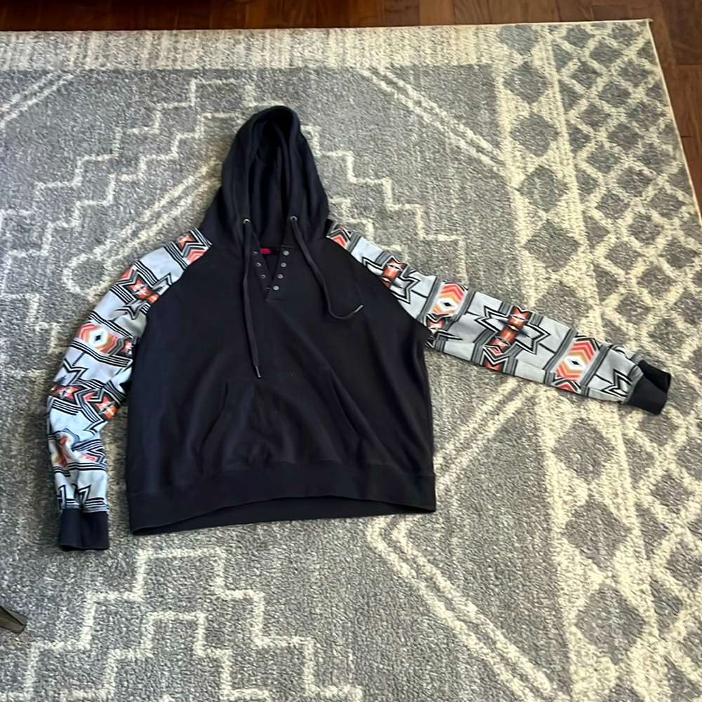 Selling a grey,black, and peach colored Rock and Roll sweat shirt.